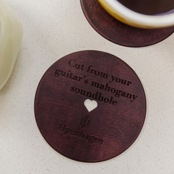 From the guitar’s heart to your home. A warm reminder that your coffee mug now rests on a piece of your guitar.